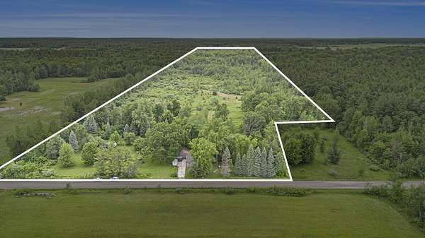 38 Acres of Recreational Land with Home for Sale in Rhodes, Michigan