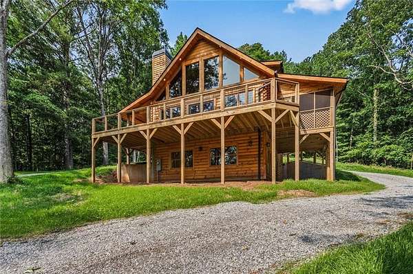 5.22 Acres of Residential Land with Home for Sale in Ball Ground, Georgia