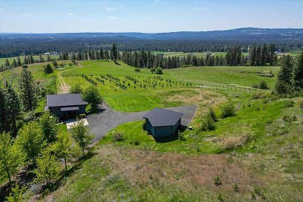 69.6 Acres of Land with Home for Sale in Colbert, Washington