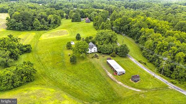 2 Acres of Residential Land with Home for Sale in Tracys Landing, Maryland