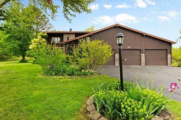 4 Acres of Residential Land with Home for Sale in Penfield, New York