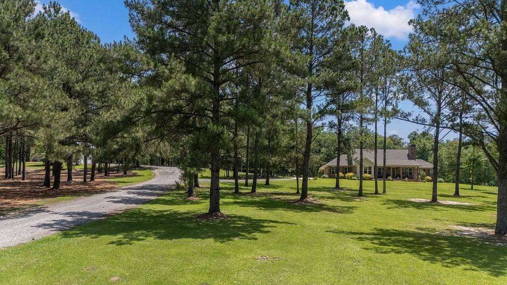 27 Acres of Agricultural Land with Home for Sale in Hope Hull, Alabama