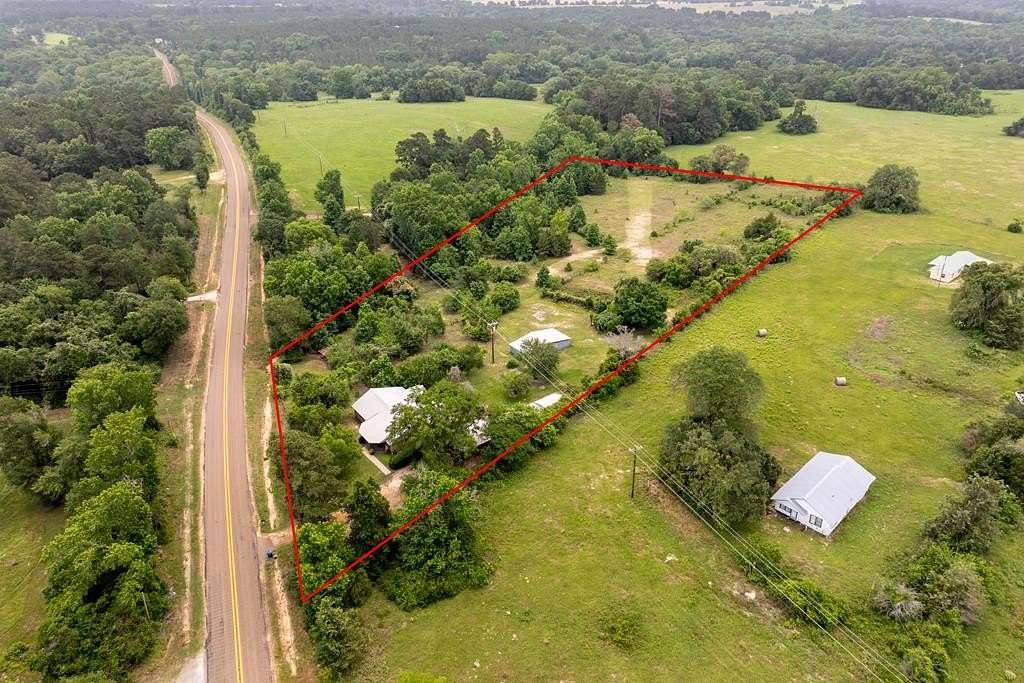7.36 Acres of Residential Land with Home for Sale in Grapeland, Texas