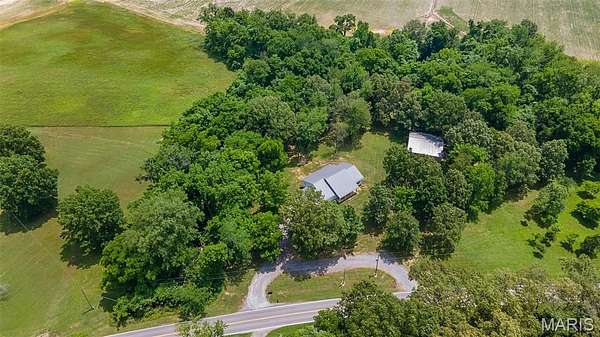 2.12 Acres of Residential Land with Home for Sale in Scott City, Missouri