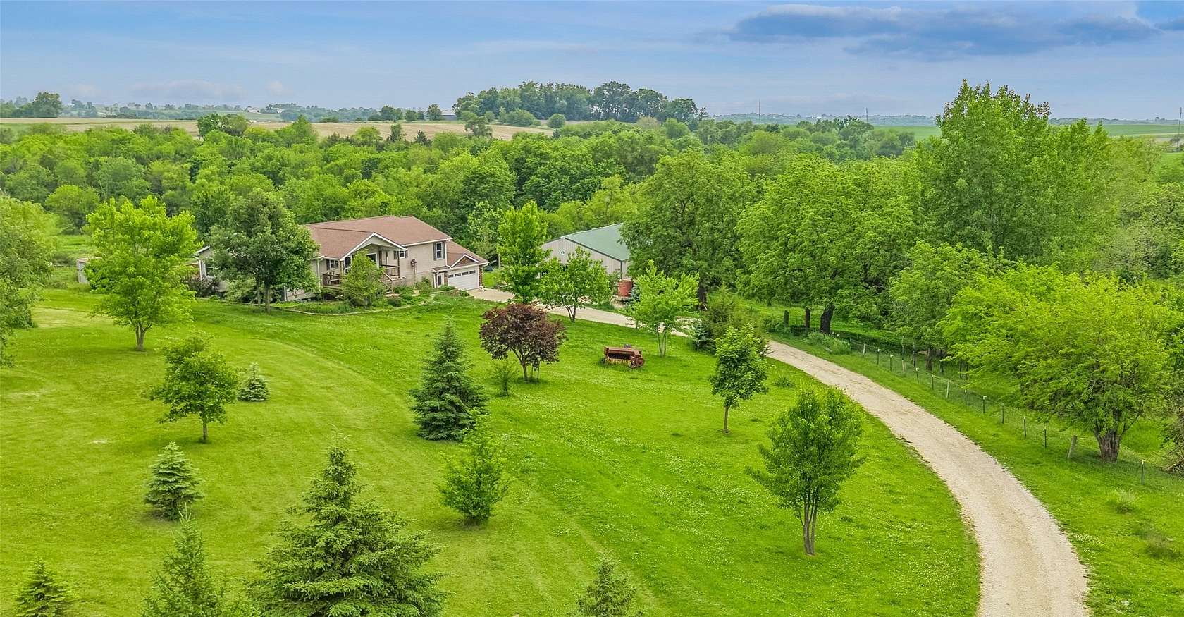 11.4 Acres of Land with Home for Sale in Winterset, Iowa