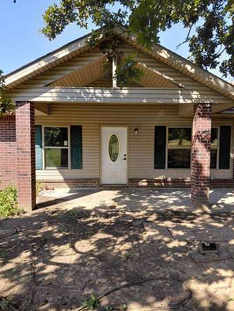 20 Acres of Agricultural Land with Home for Sale in Stigler, Oklahoma