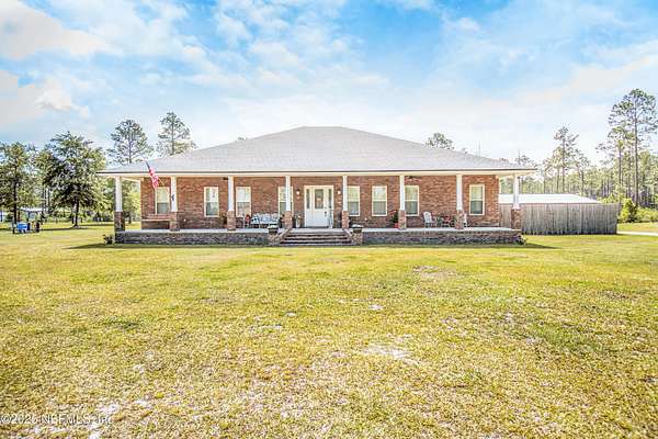 14.7 Acres of Land with Home for Sale in Glen St. Mary, Florida