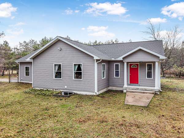 20 Acres of Agricultural Land with Home for Sale in Benzonia, Michigan