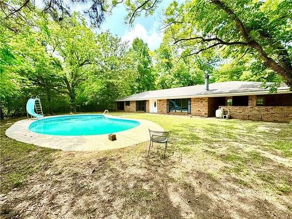 3.3 Acres of Residential Land with Home for Sale in Pineville, Louisiana