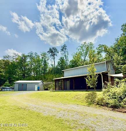 10.6 Acres of Land with Home for Sale in Tellico Plains, Tennessee