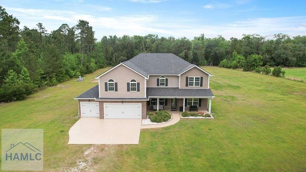 5.6 Acres of Land with Home for Sale in Ludowici, Georgia