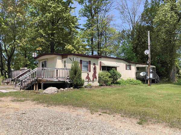 2.1 Acres of Residential Land with Home for Sale in Farwell, Michigan