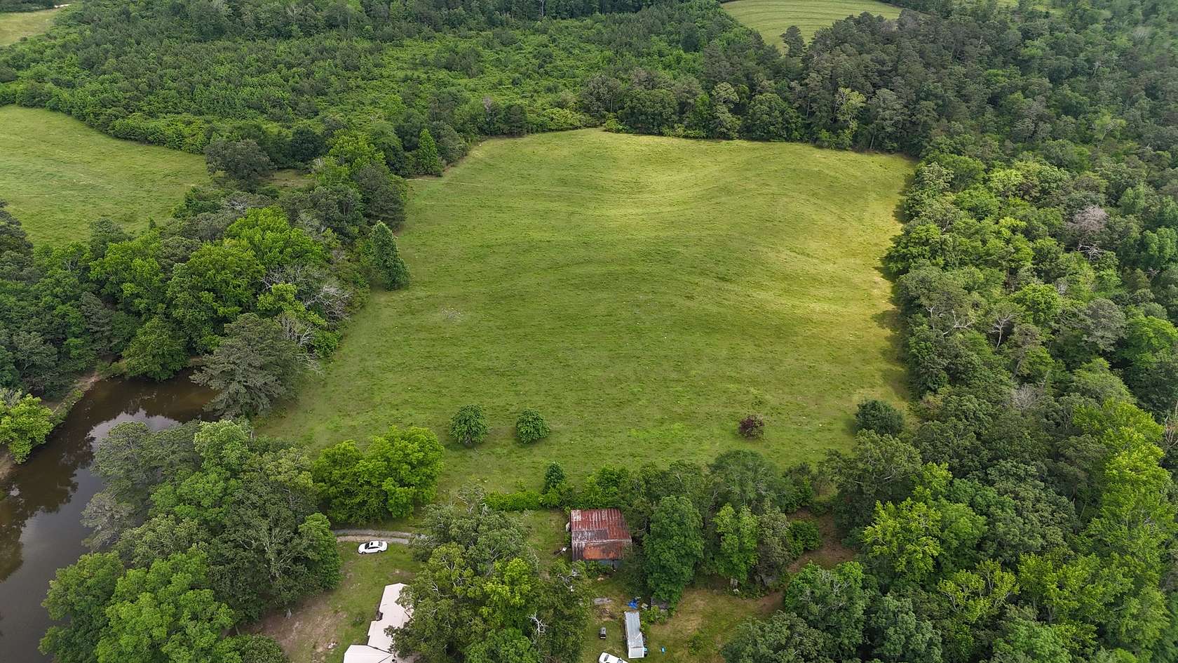 68 Acres of Land with Home for Sale in Collinsville, Alabama