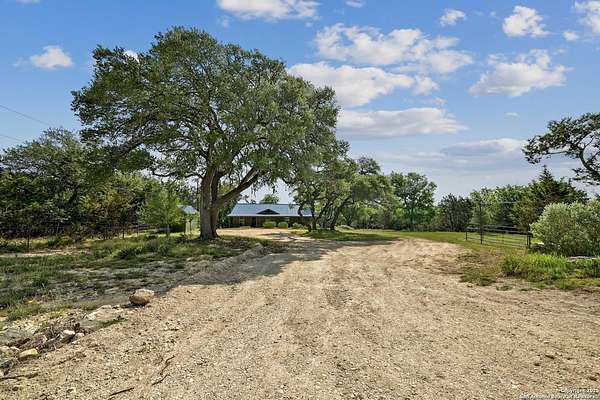 5 Acres of Land with Home for Sale in Blanco, Texas