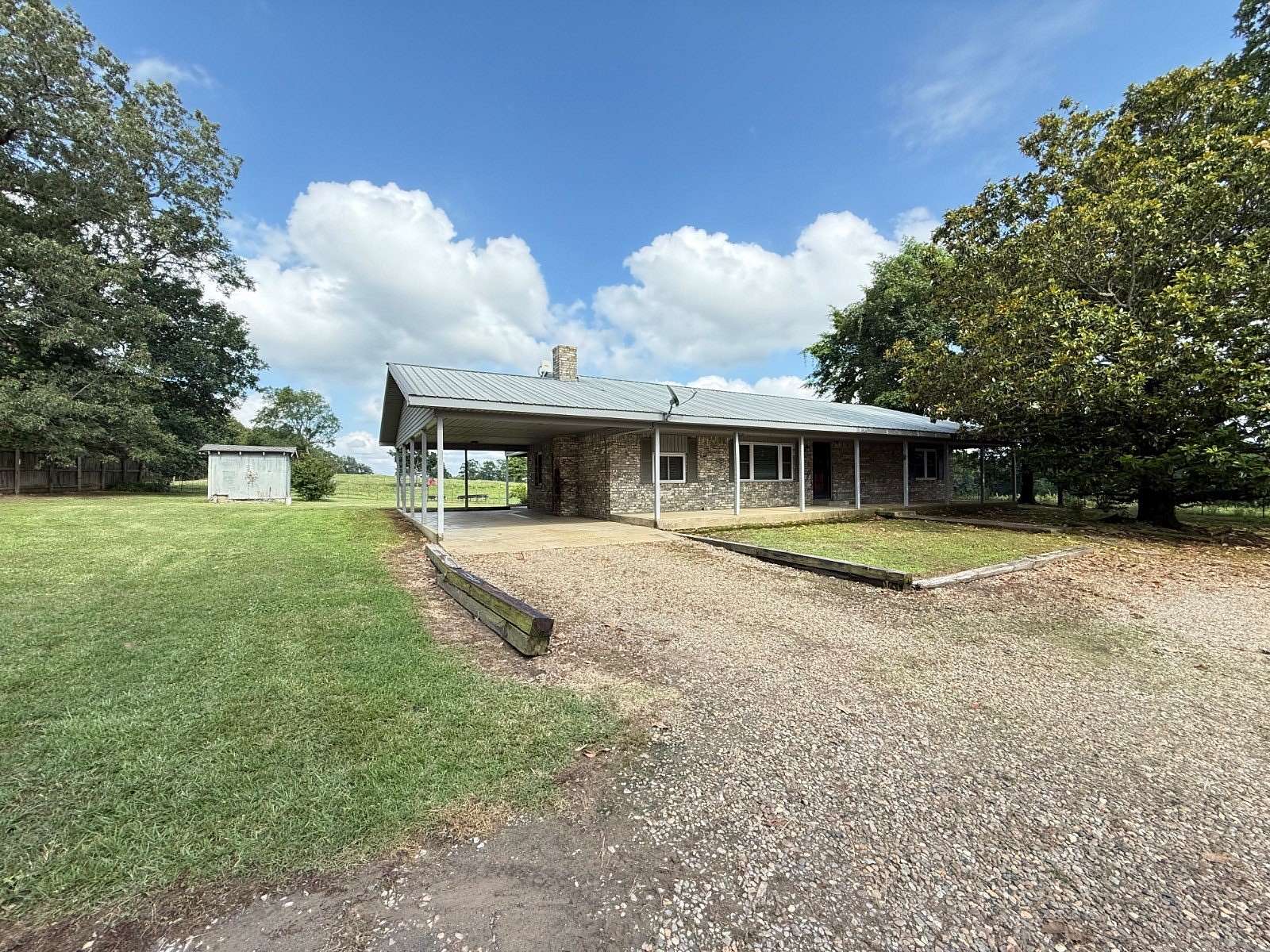 7.84 Acres of Land with Home for Sale in Broken Bow, Oklahoma