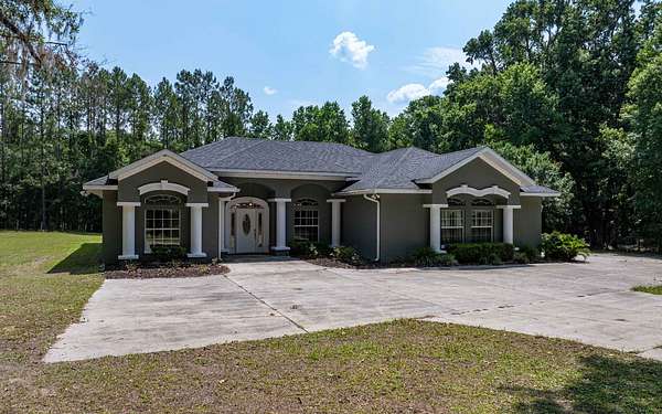 3 Acres of Residential Land with Home for Sale in High Springs, Florida