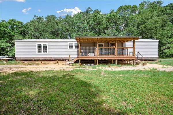 9.7 Acres of Residential Land with Home for Sale in Grand Bay, Alabama