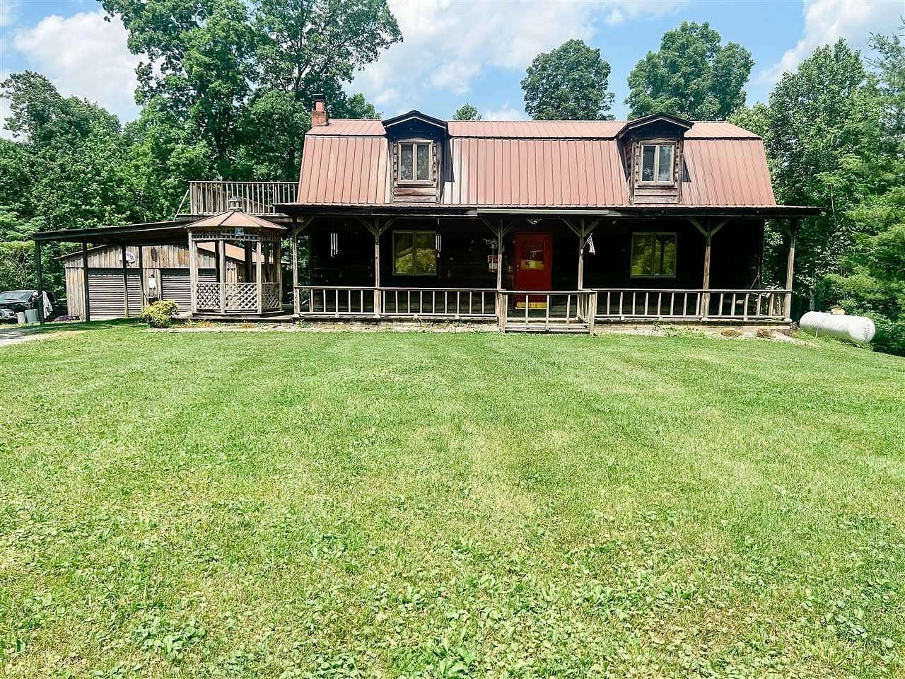 16.3 Acres of Land with Home for Sale in Roundhill, Kentucky