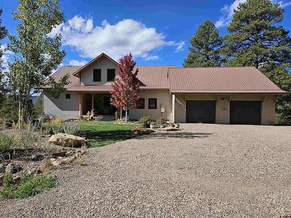 3.26 Acres of Residential Land with Home for Sale in Pagosa Springs, Colorado