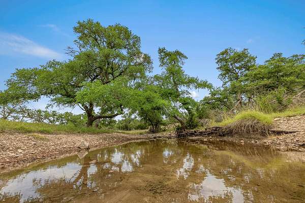 397 Acres of Land with Home for Sale in Harper, Texas