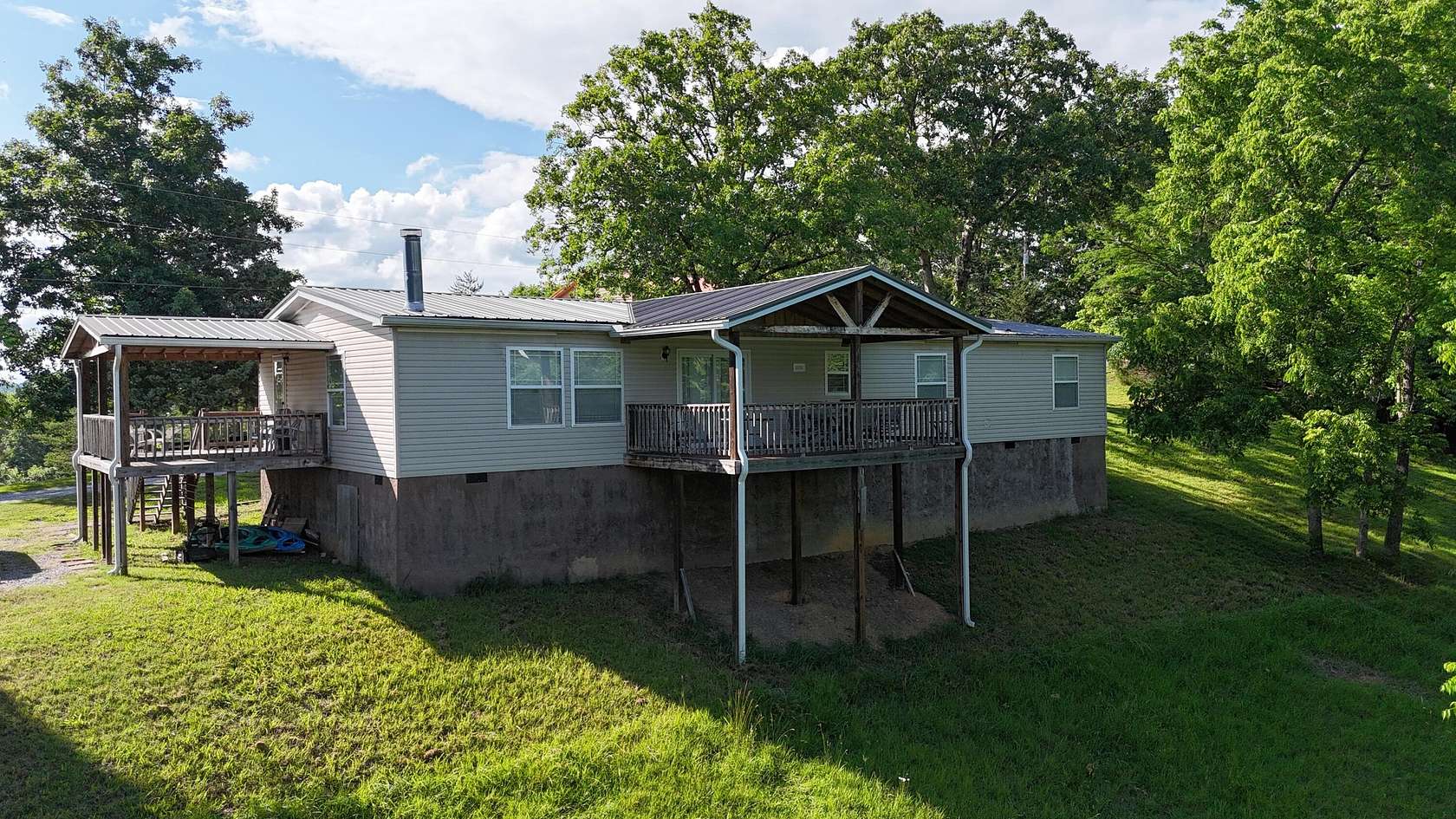 1.7 Acres of Residential Land with Home for Sale in Dandridge, Tennessee