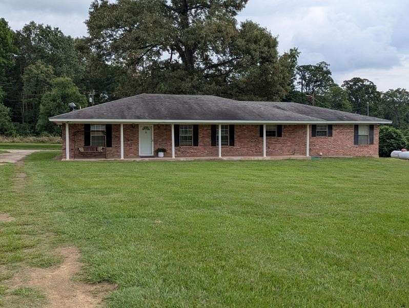 6 Acres of Residential Land with Home for Sale in Garrison, Texas