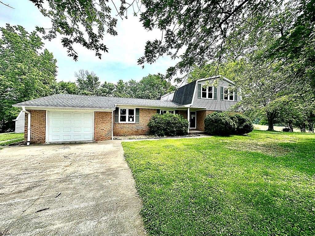 1.75 Acres of Land with Home for Sale in Slaughters, Kentucky