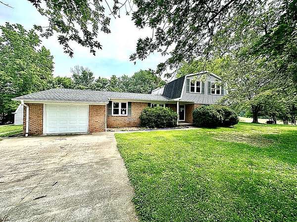 1.75 Acres of Land with Home for Sale in Slaughters, Kentucky