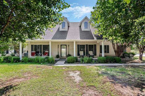 5 Acres of Residential Land with Home for Sale in Rhome, Texas