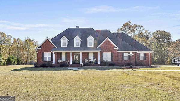 6.1 Acres of Residential Land with Home for Sale in Brooks, Georgia