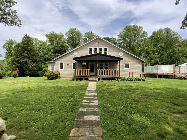 16.2 Acres of Land with Home for Sale in Liberty, Kentucky
