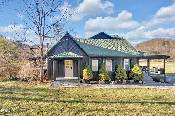 3 Acres of Residential Land with Home for Sale in Roan Mountain, Tennessee