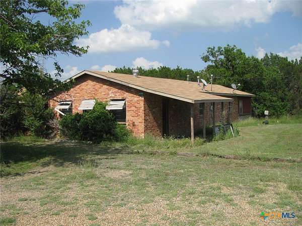 1.64 Acres of Residential Land with Home for Sale in Evant, Texas