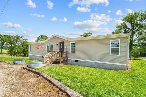 2 Acres of Residential Land with Home for Sale in Eagle Rock, Missouri