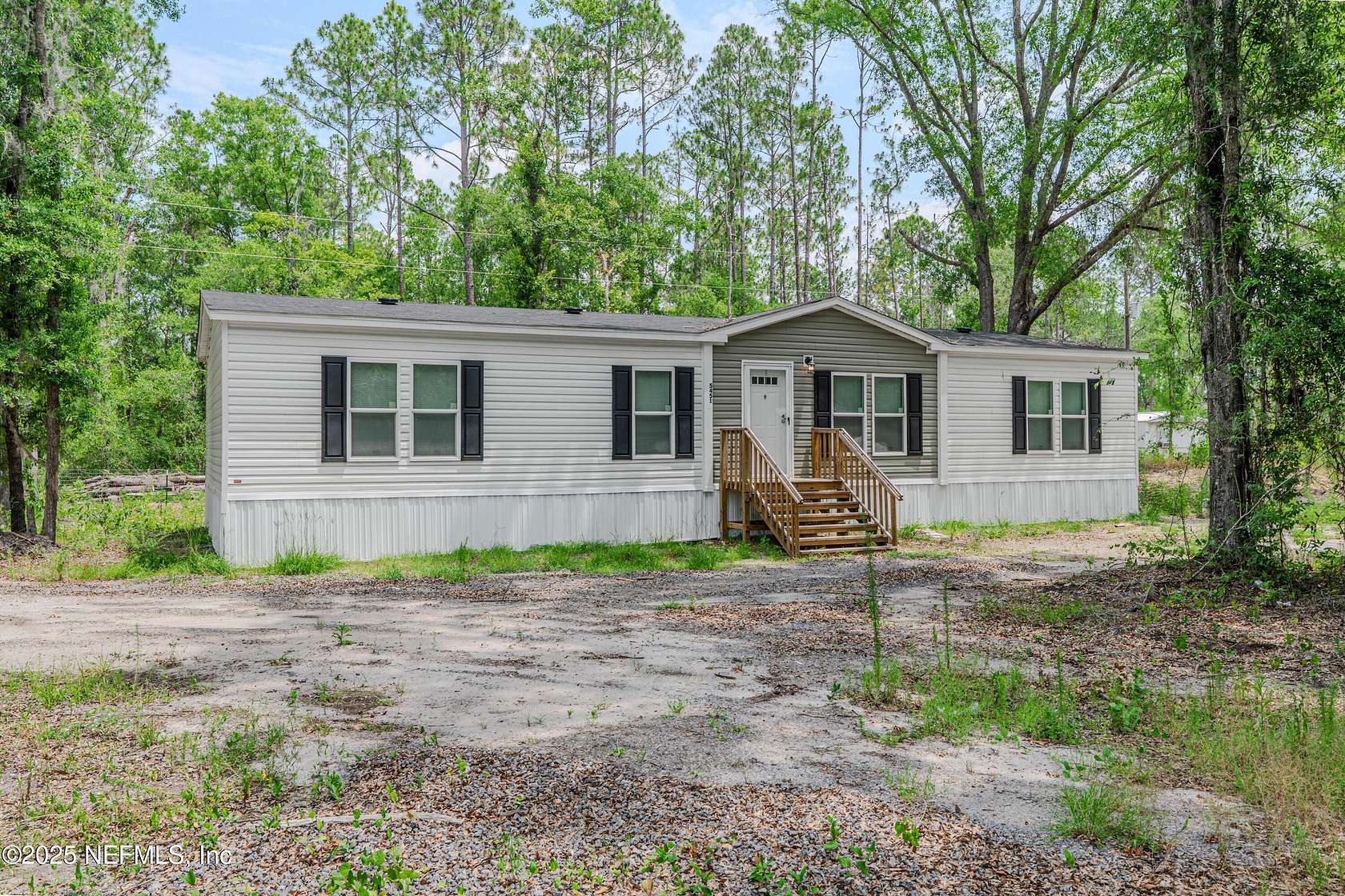 2 Acres of Residential Land with Home for Sale in Starke, Florida