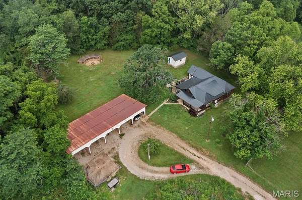 29 Acres of Land with Home for Sale in Arcadia, Missouri