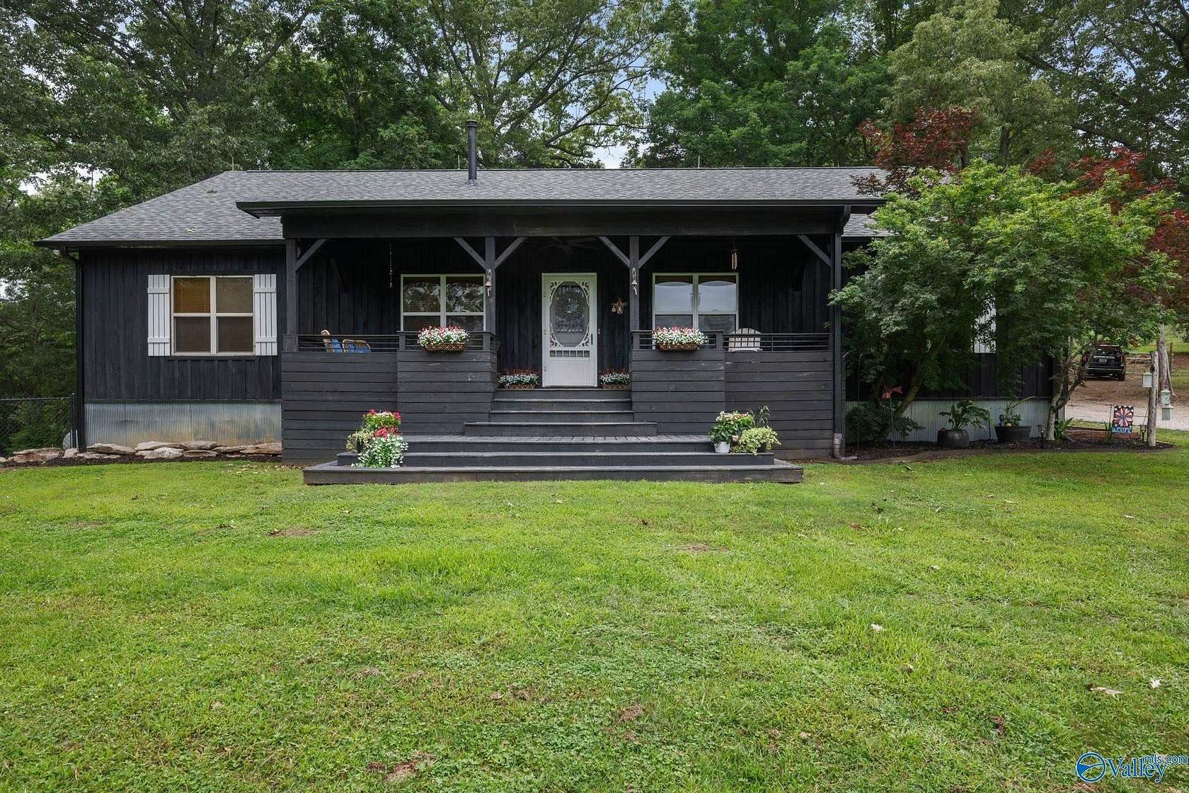 10 Acres of Land with Home for Sale in Elkmont, Alabama