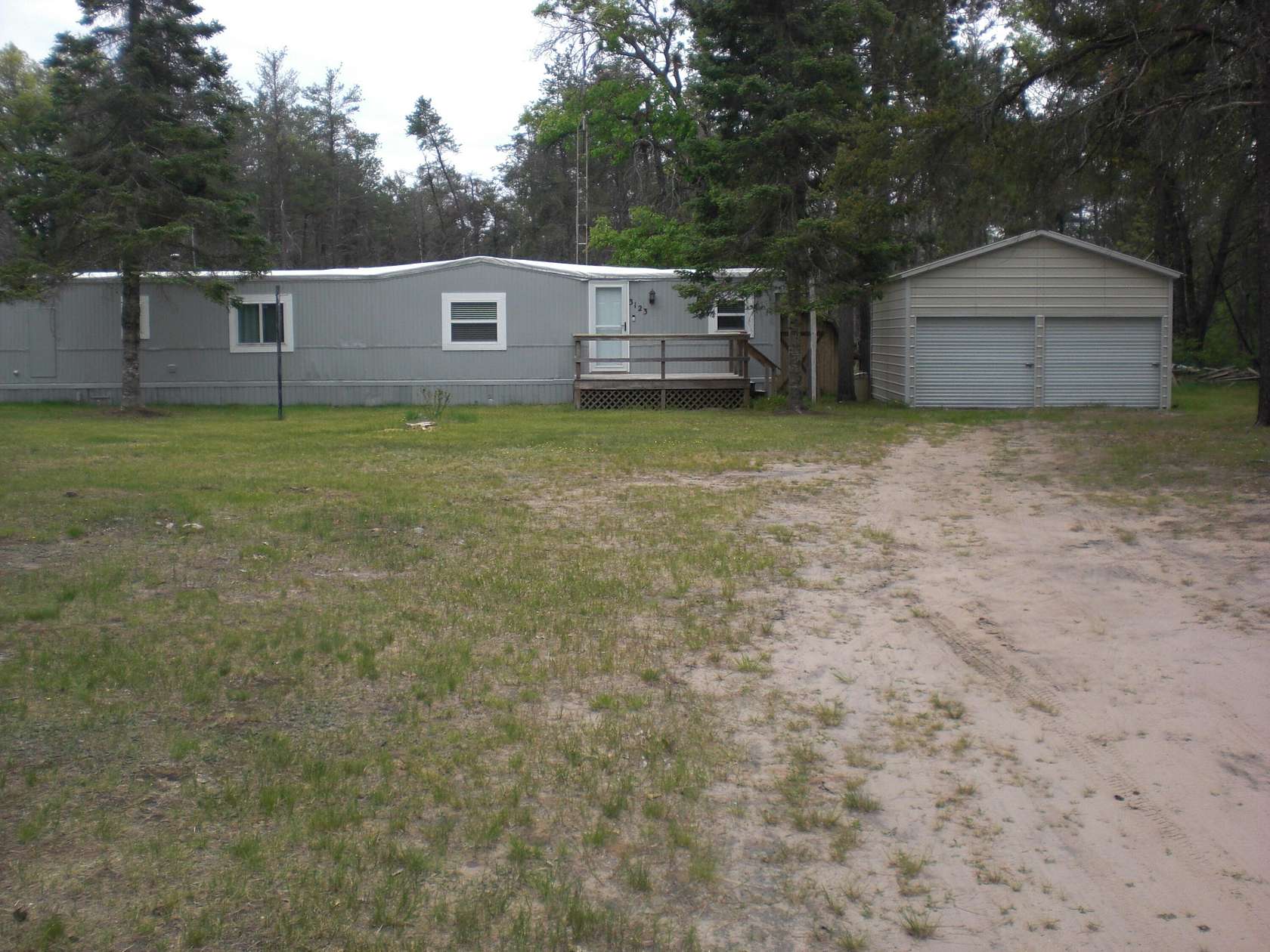 5 Acres of Residential Land with Home for Sale in Grayling, Michigan