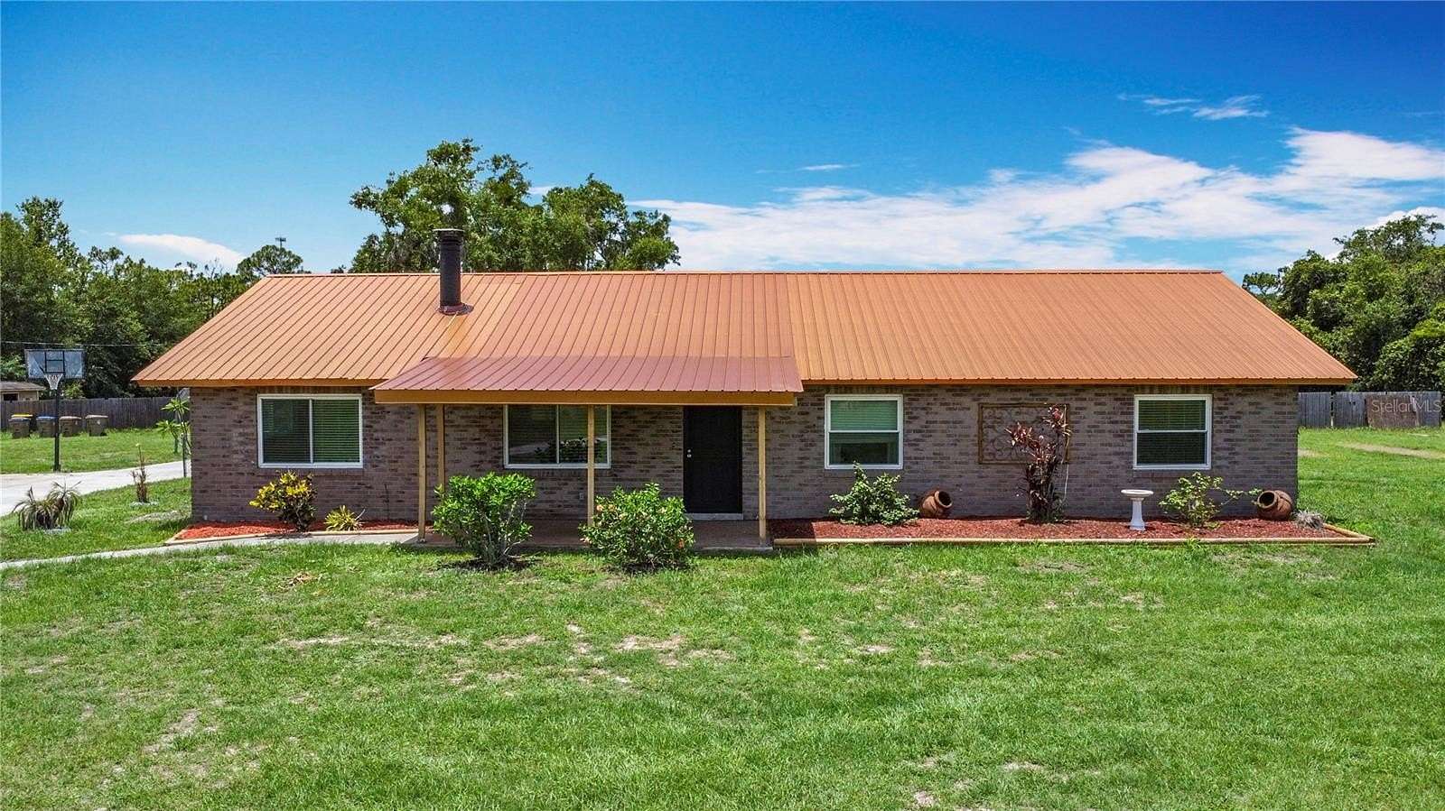 2.42 Acres of Residential Land with Home for Sale in St. Cloud, Florida