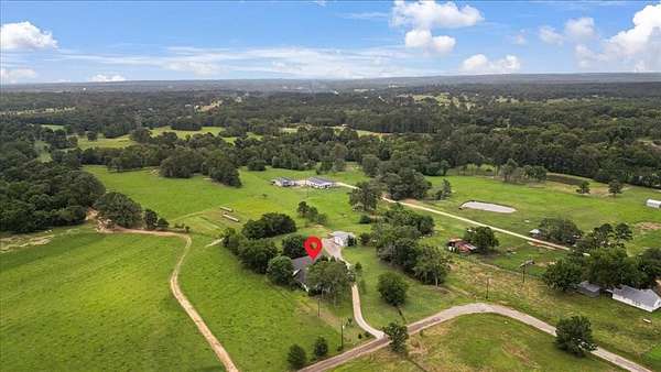 2 Acres of Residential Land with Home for Sale in Lindale, Texas