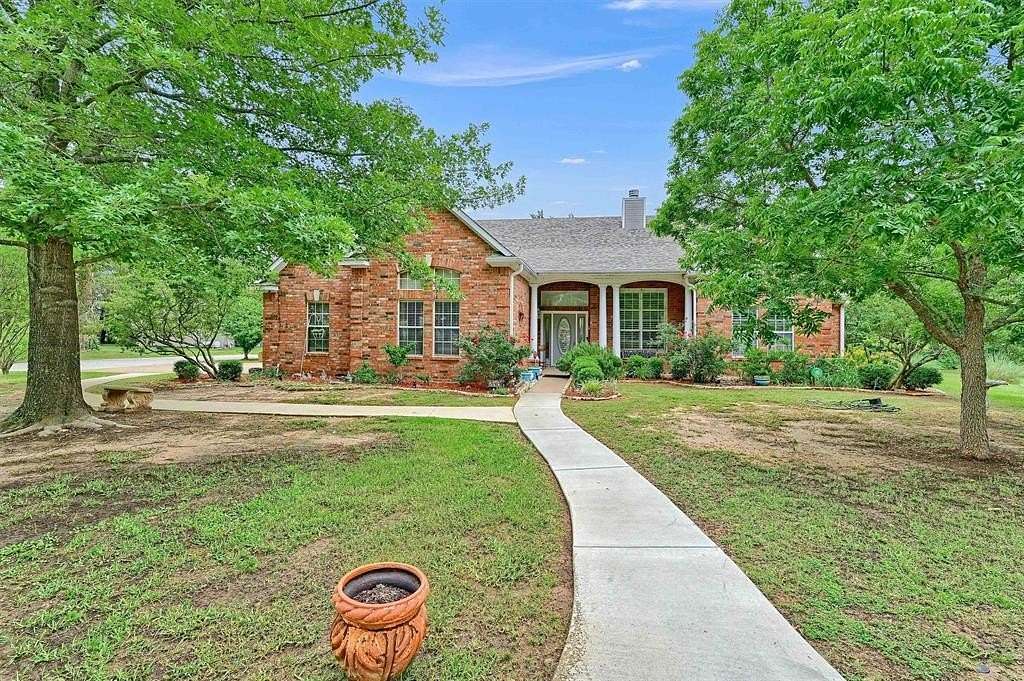 3.89 Acres of Residential Land with Home for Sale in Denison, Texas