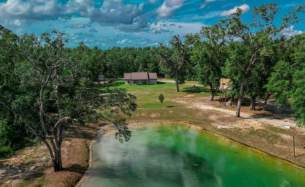 11 Acres of Land with Home for Sale in Live Oak, Florida