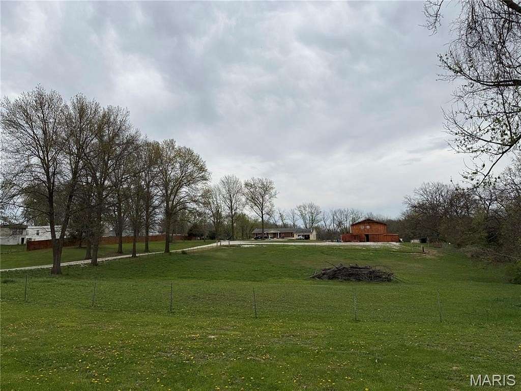 10 Acres of Residential Land with Home for Sale in Winfield, Missouri