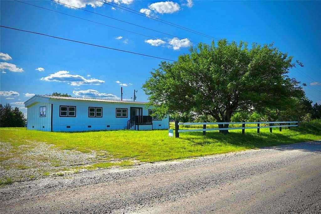 4 Acres of Residential Land with Home for Sale in Prague, Oklahoma