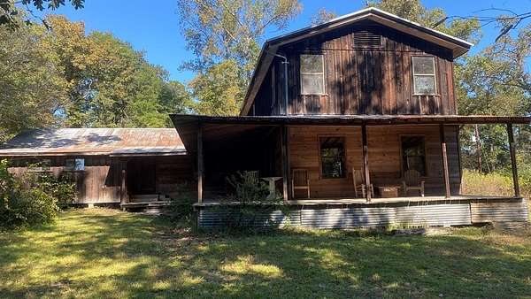 14.3 Acres of Land with Home for Sale in Burkeville, Texas