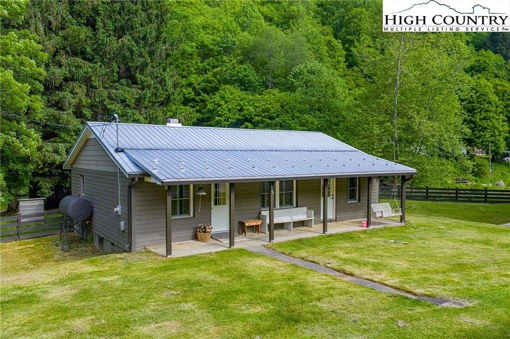 8 Acres of Land with Home for Sale in Lansing, North Carolina
