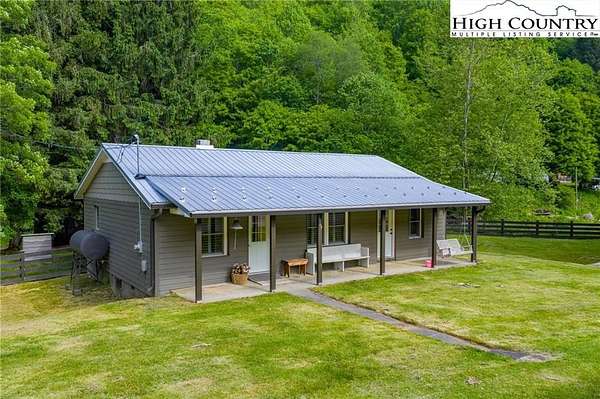 8 Acres of Land with Home for Sale in Lansing, North Carolina