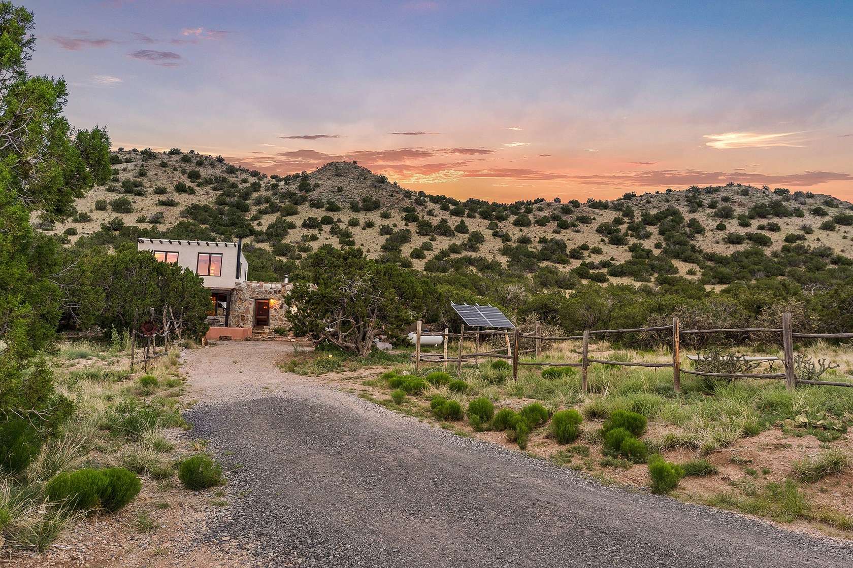 10 Acres of Land with Home for Sale in Madrid, New Mexico