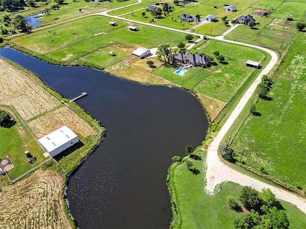 11.3 Acres of Land with Home for Sale in Pilot Point, Texas