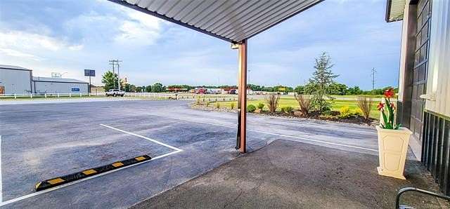 7.36 Acres of Improved Commercial Land for Sale in Checotah, Oklahoma